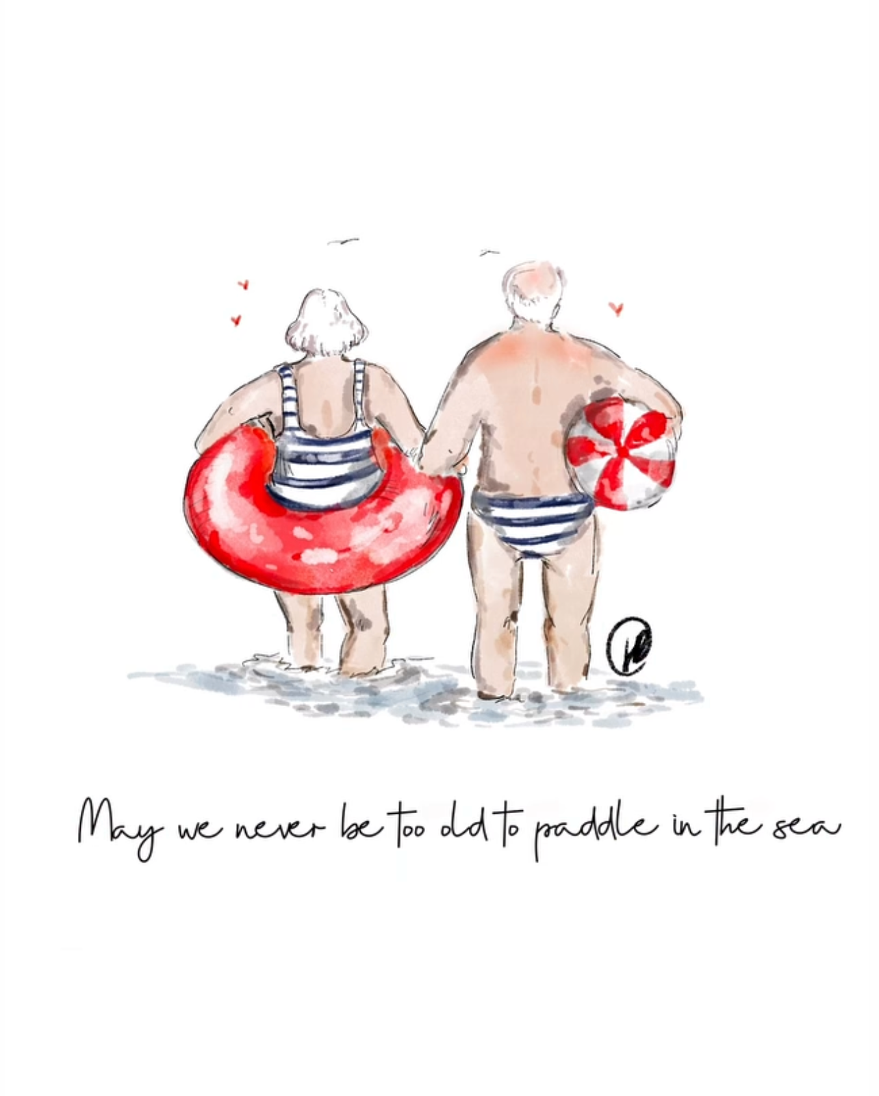 Watercolour illustration of an elderly couple holding hands at the water's edge, the woman wearing a red inflatable ring and the man holding a red and white beach ball, with the words May we never be too old to paddle in the sea.